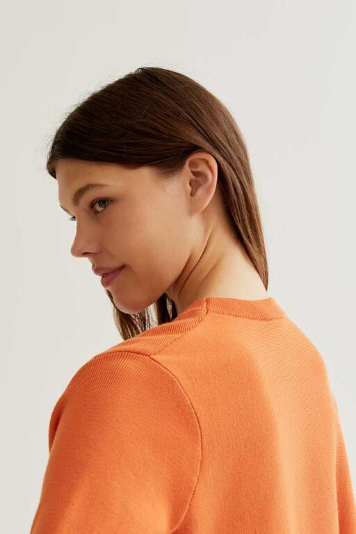 Maglione svasato