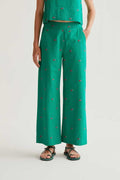 Pantaloni con ciliegie ricamate