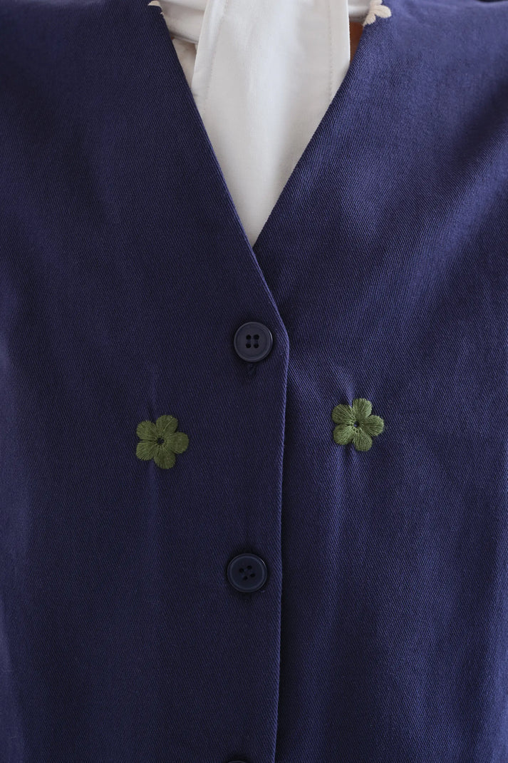 Gilet con ricami floreali