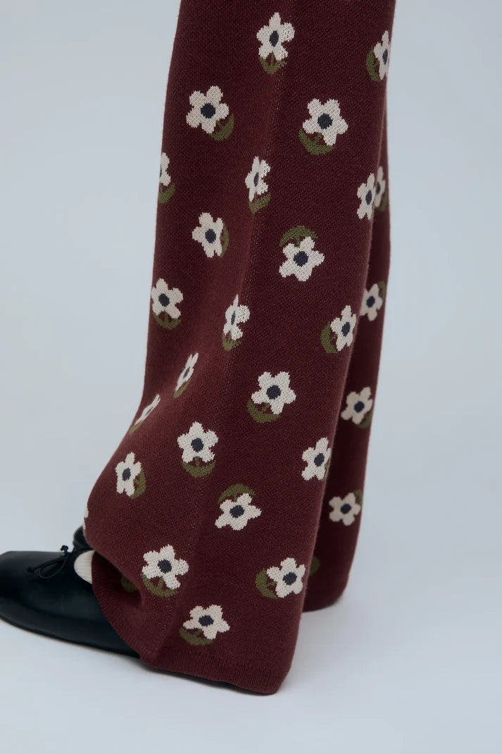 Pantaloni con maxi fiori