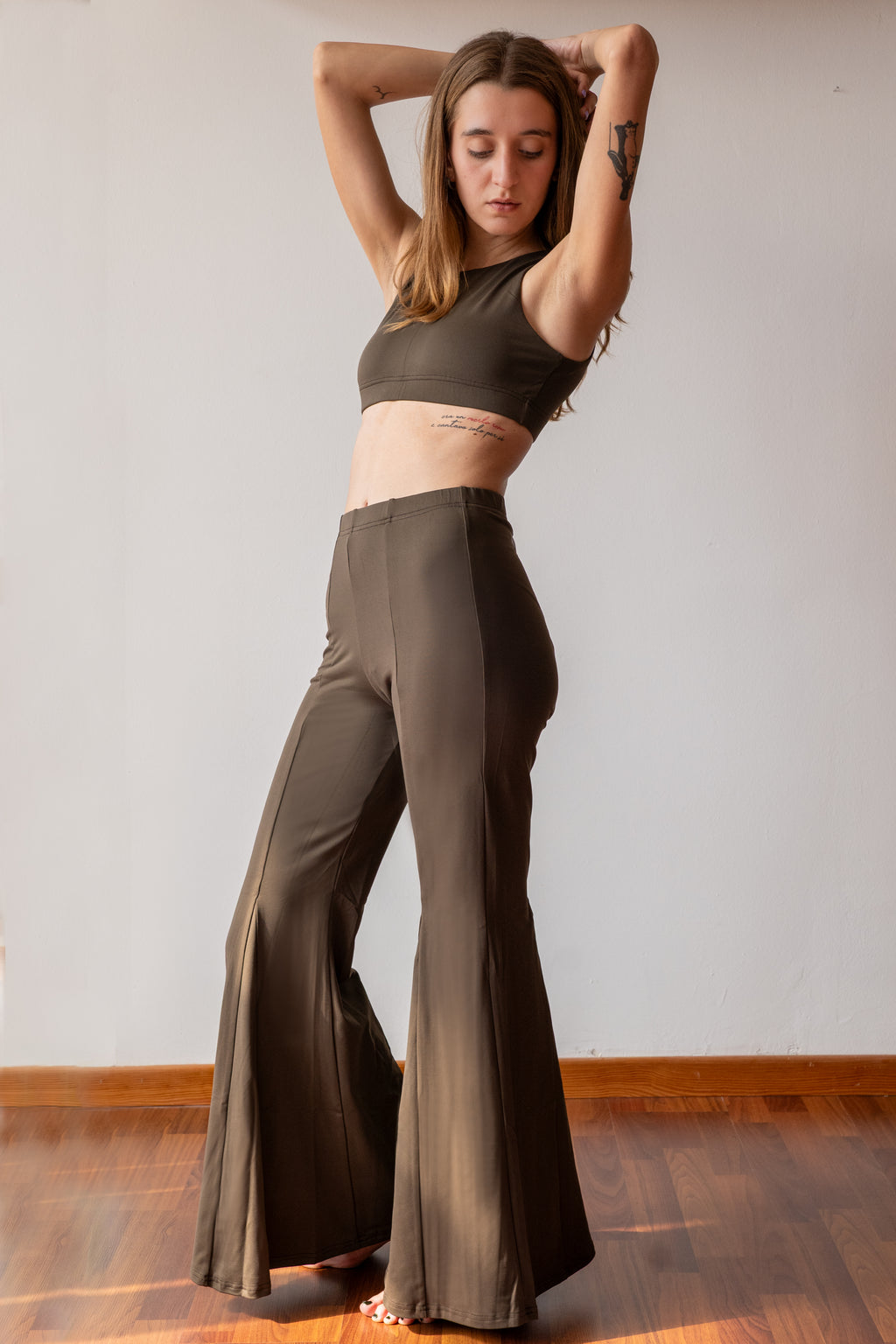 LINEA FITNESS. Top scollo americana