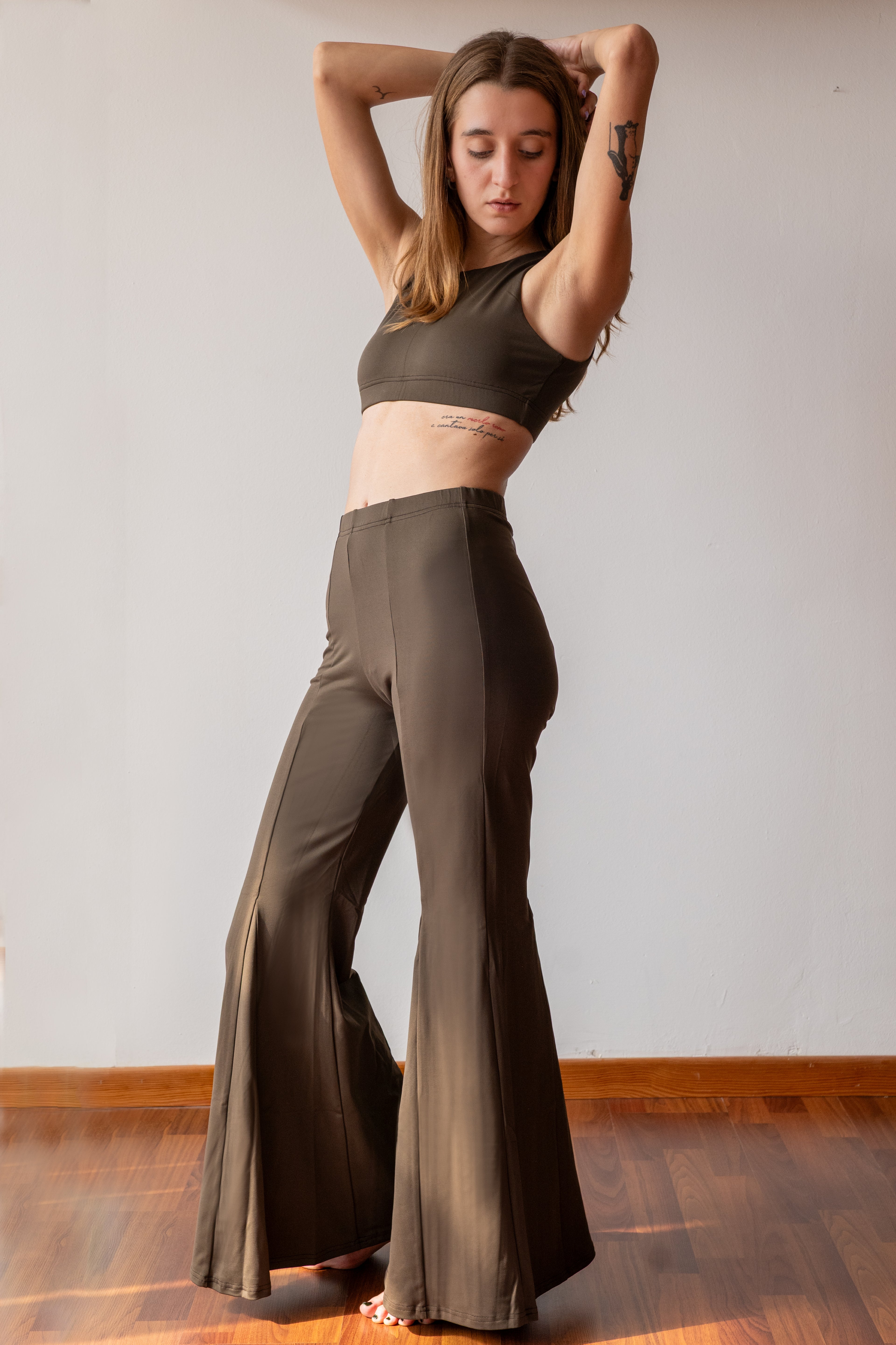 LINEA FITNESS. Top scollo americana