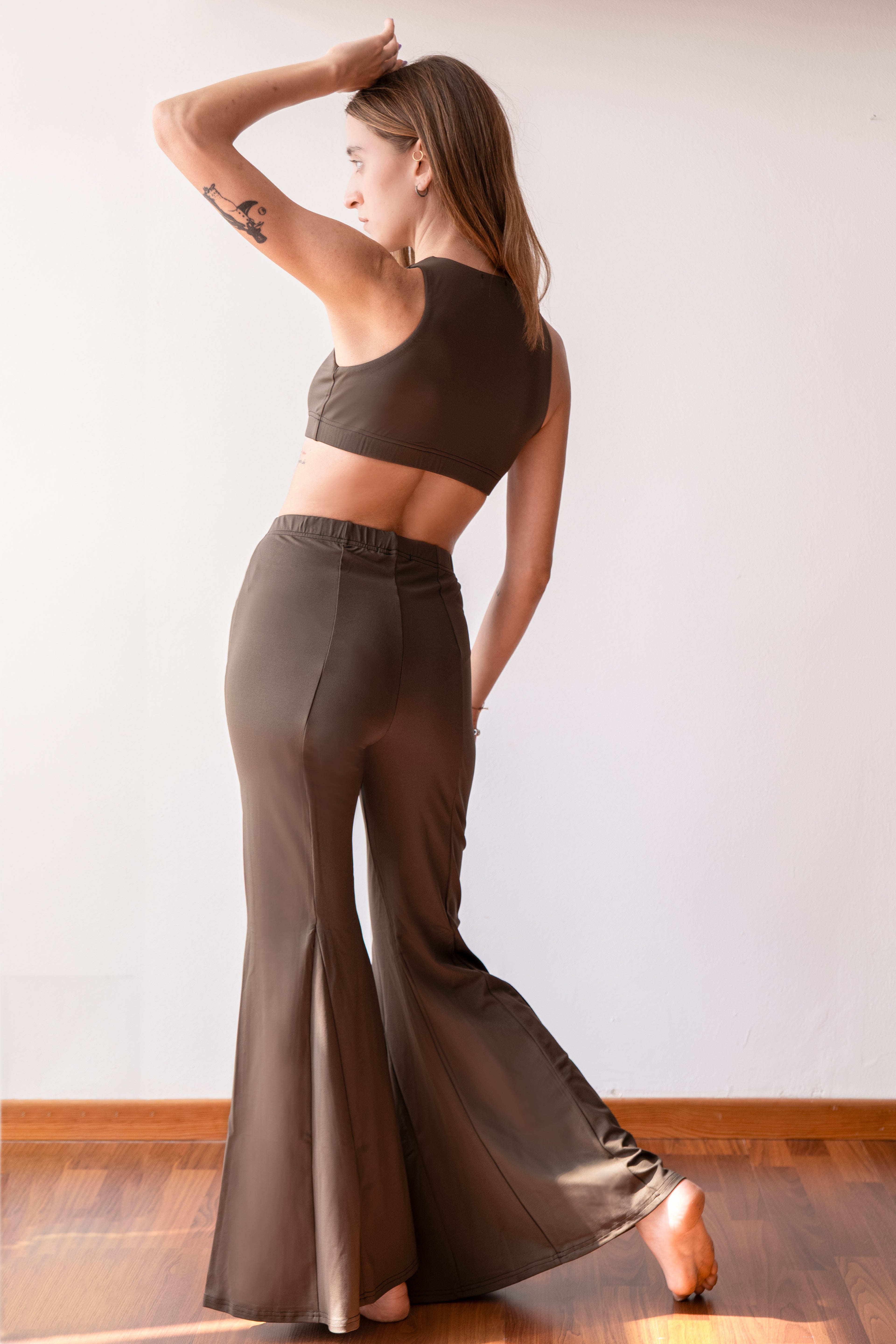 LINEA FITNESS. Top scollo americana